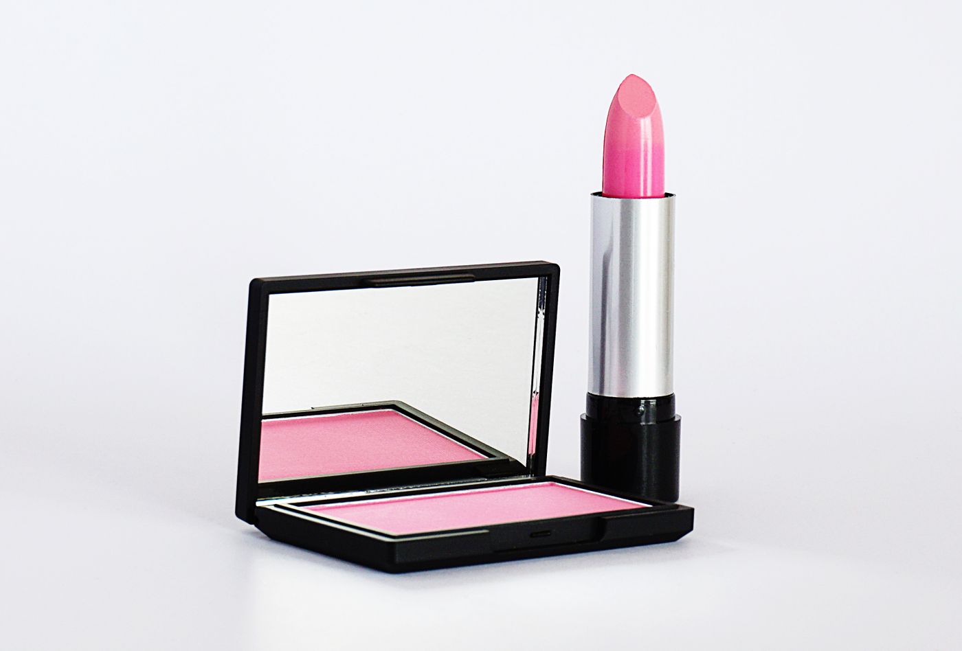 Lipsticks and glosses in warm tones